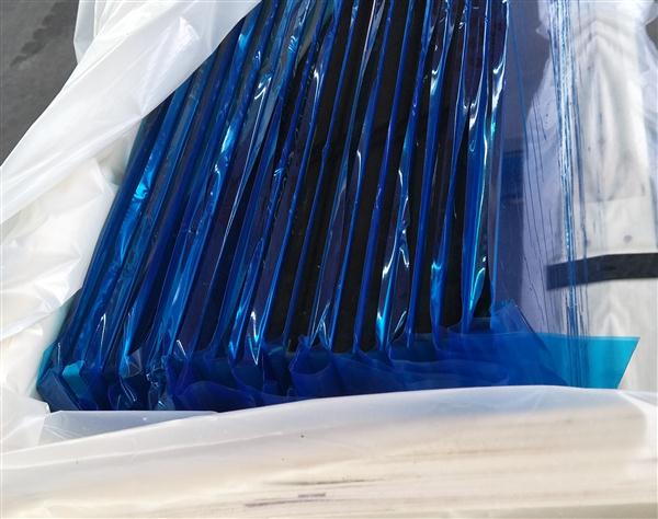 Blue Film Covered Packaging